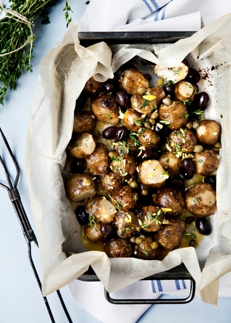 baked potatoes with olives, capers and creamy lemon-dressing